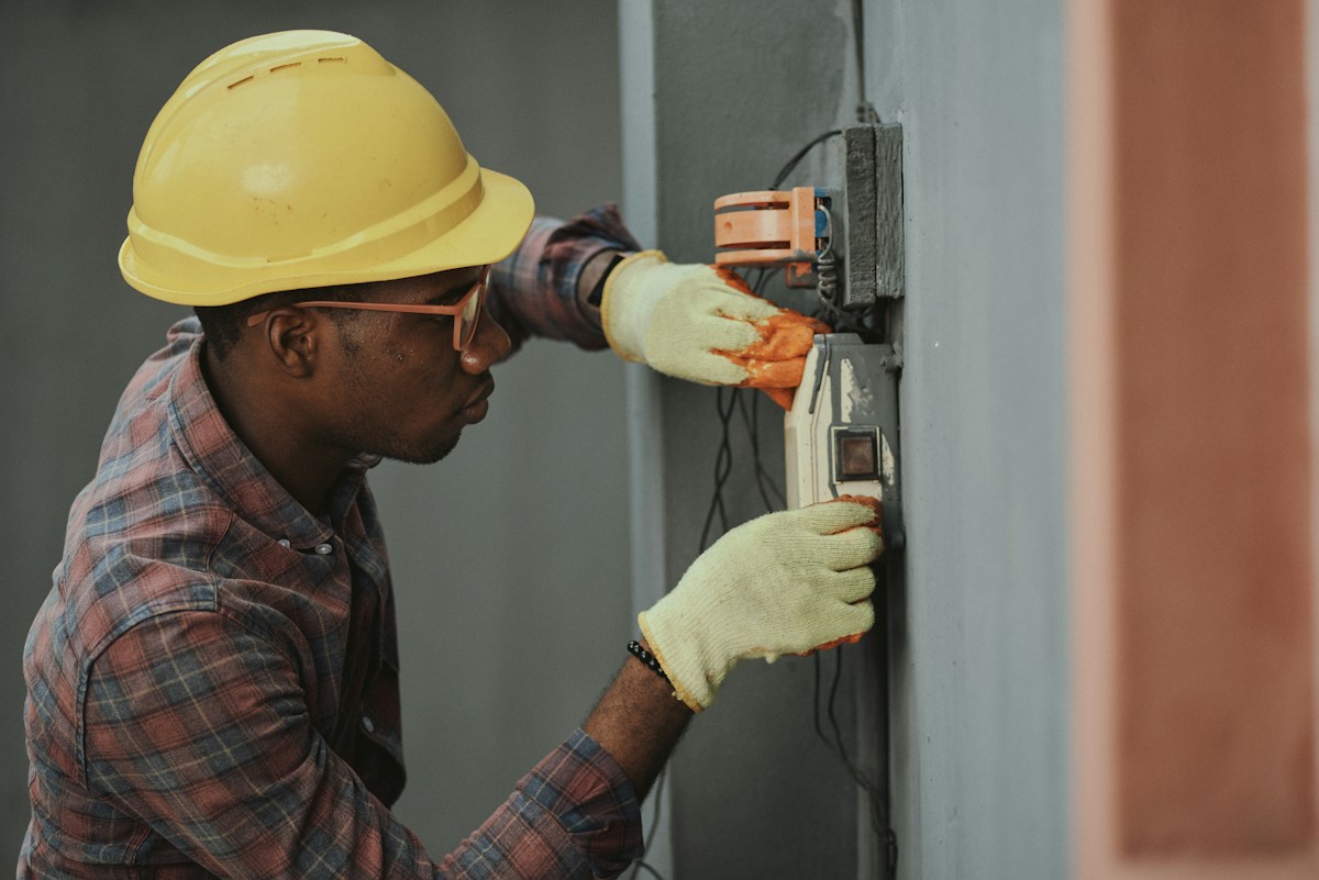A tradesperson working at a service location