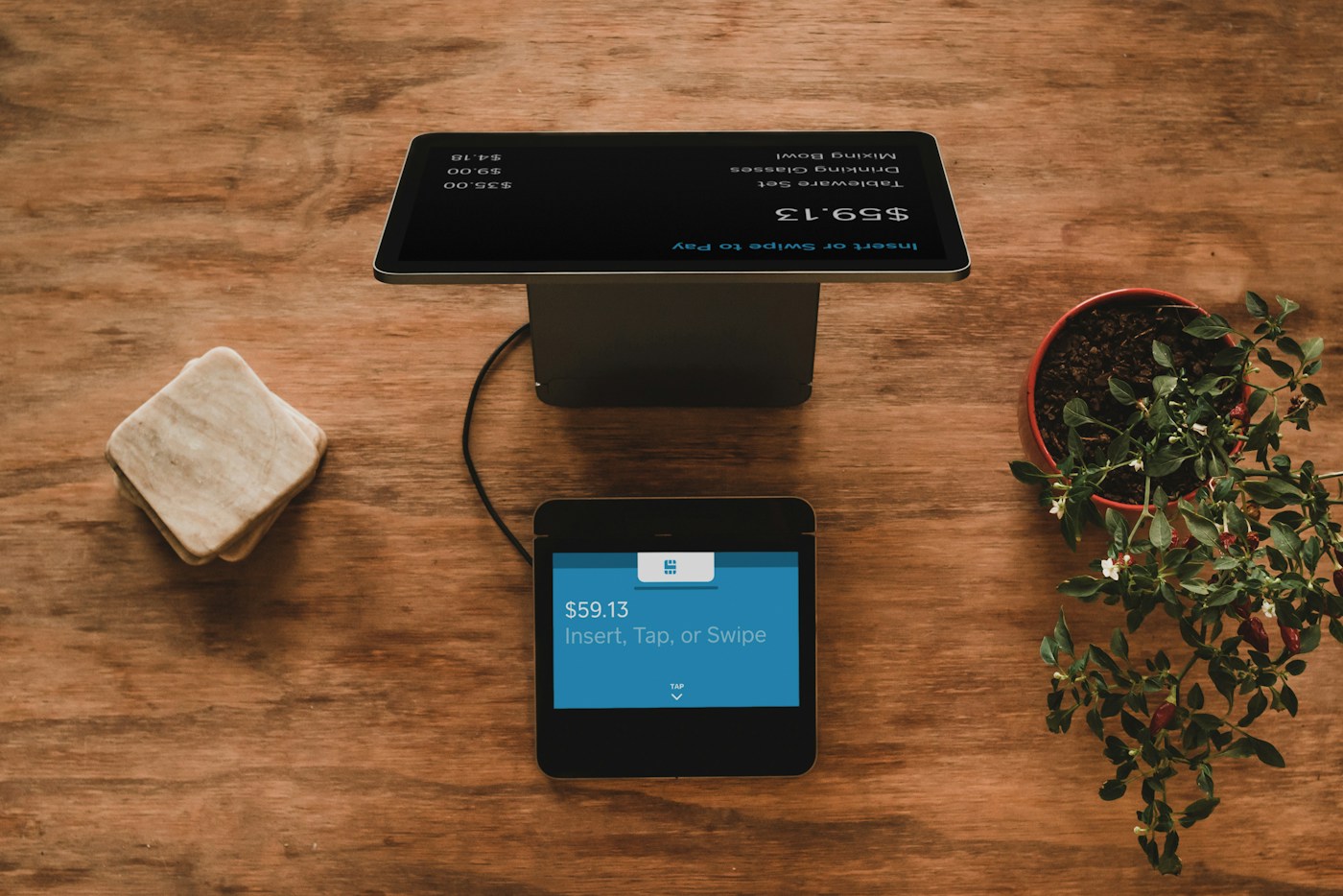 A point-of-sale display and card terminal on a merchant’s counter